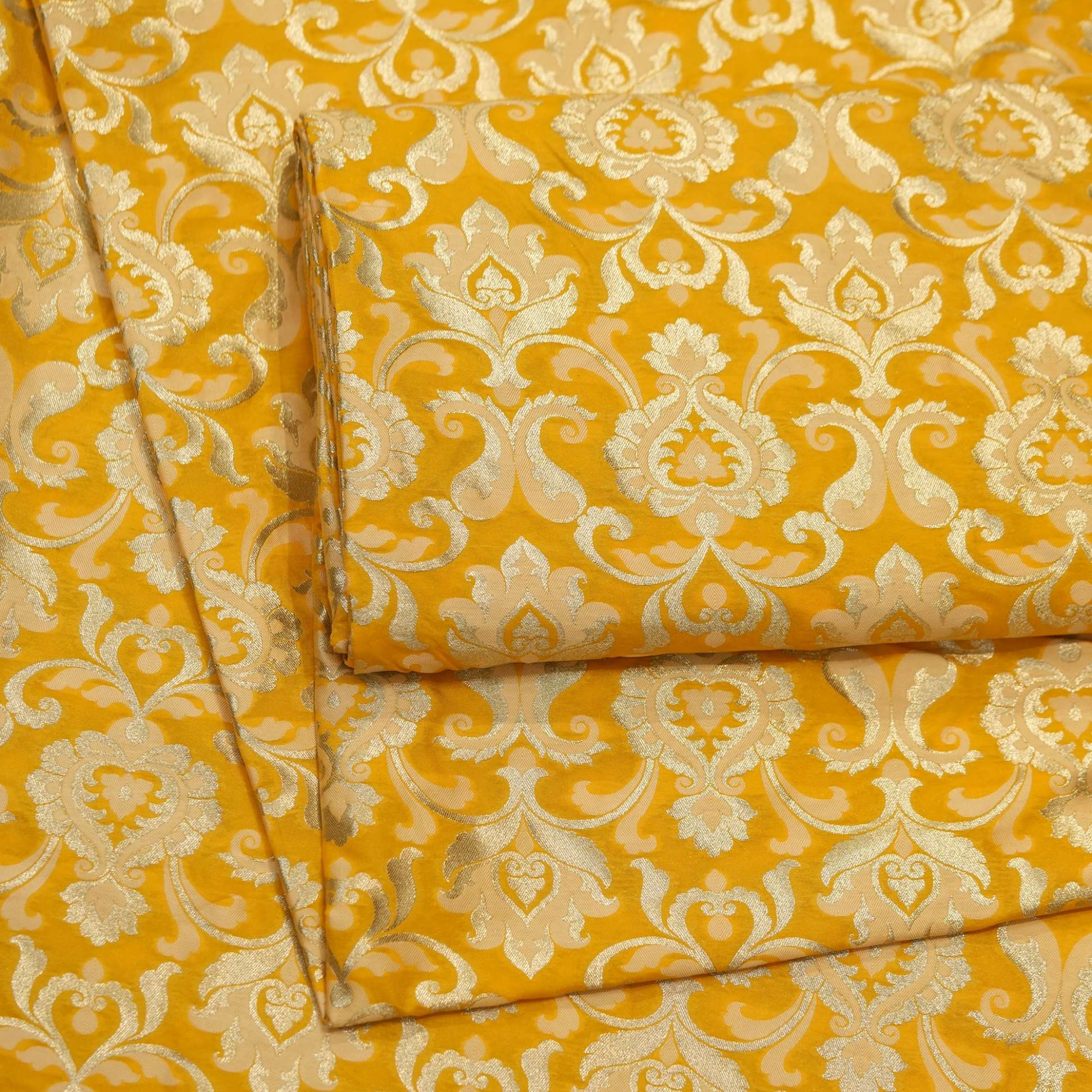 Yellow Indian silk fabric with intricate Persian-style Zari jaal in light gold
