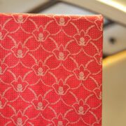Royal red silk fabric with tissue diamond jacquard and golden Zari jaal pattern