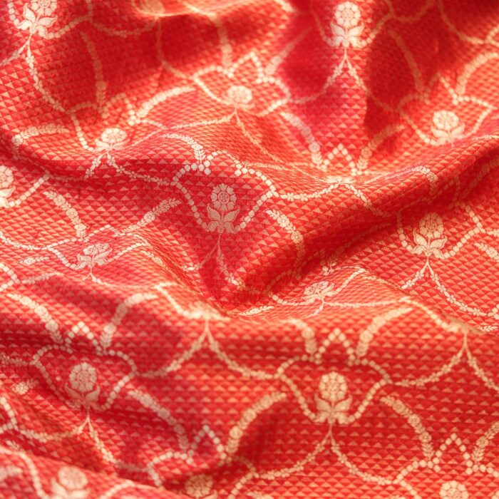 Royal red silk fabric with tissue diamond jacquard and golden Zari jaal pattern