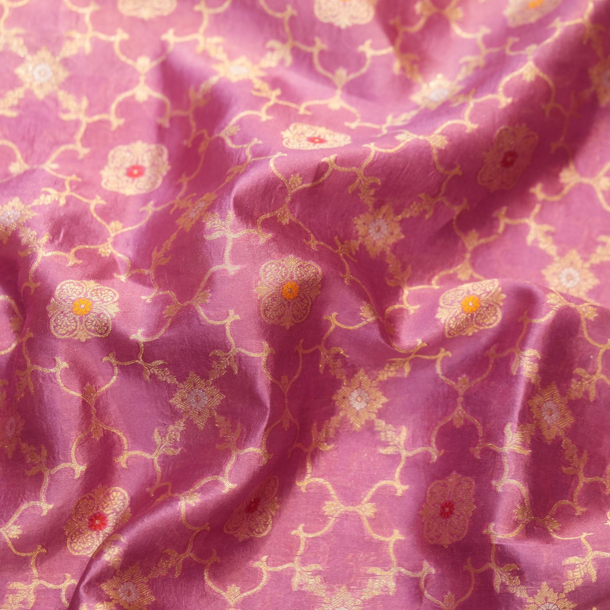 Rose pink silk fabric with golden Mughal jaal and floral Meena motifs