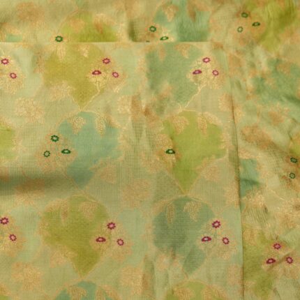 Pure hand-dyed Rangkaat silk fabric in green with golden Zari jaal and colorful Meena floral accents – Gulnaar-e-Rangkaat