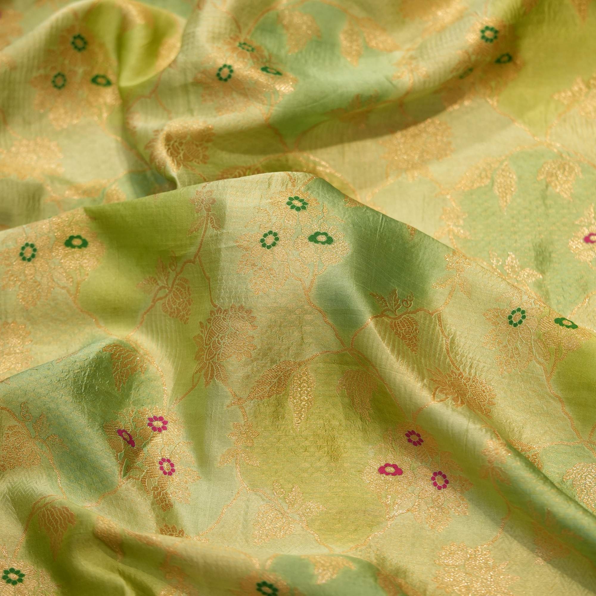Pure hand-dyed Rangkaat silk fabric in green with golden Zari jaal and colorful Meena floral accents – Gulnaar-e-Rangkaat