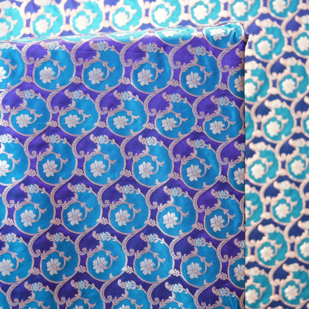 Indian Rangkaat silk in dual-tone blue with floral circular Zari jaal – Shahnoor-e-Neelam