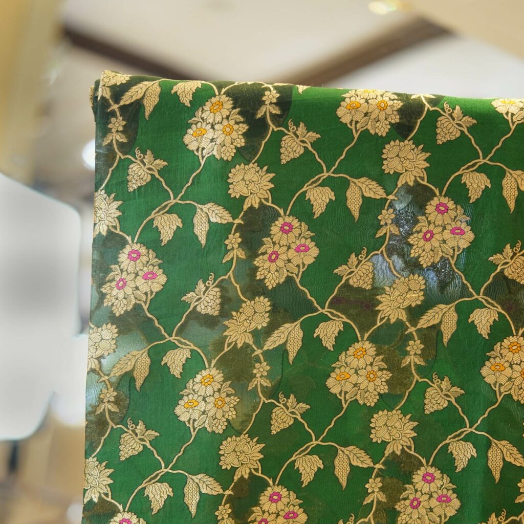 Green Dupion silk x tissue jacquard fabric with golden Zari floral jaal and Meena embroidery – Gul-e-Badri