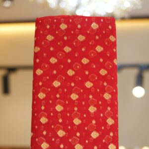 Rich red pure organza fabric with golden zari woven leaf motifs