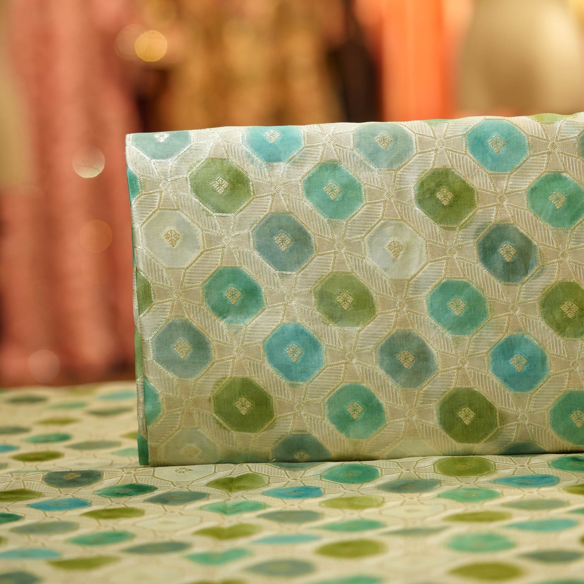 Katan silk fabric with octagonal Zari weaving and multitone green-blue rangkaat dye