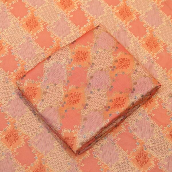 Peach-orange cotton jacquard fabric with golden Zari weave and floral printed pattern – Firdaws-e-Zar