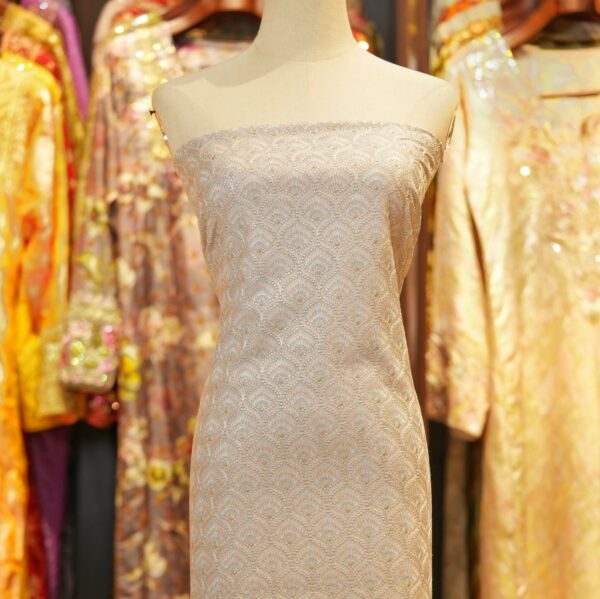 Ivory beige pure silk fabric with geometric embroidered design and subtle golden zari dots